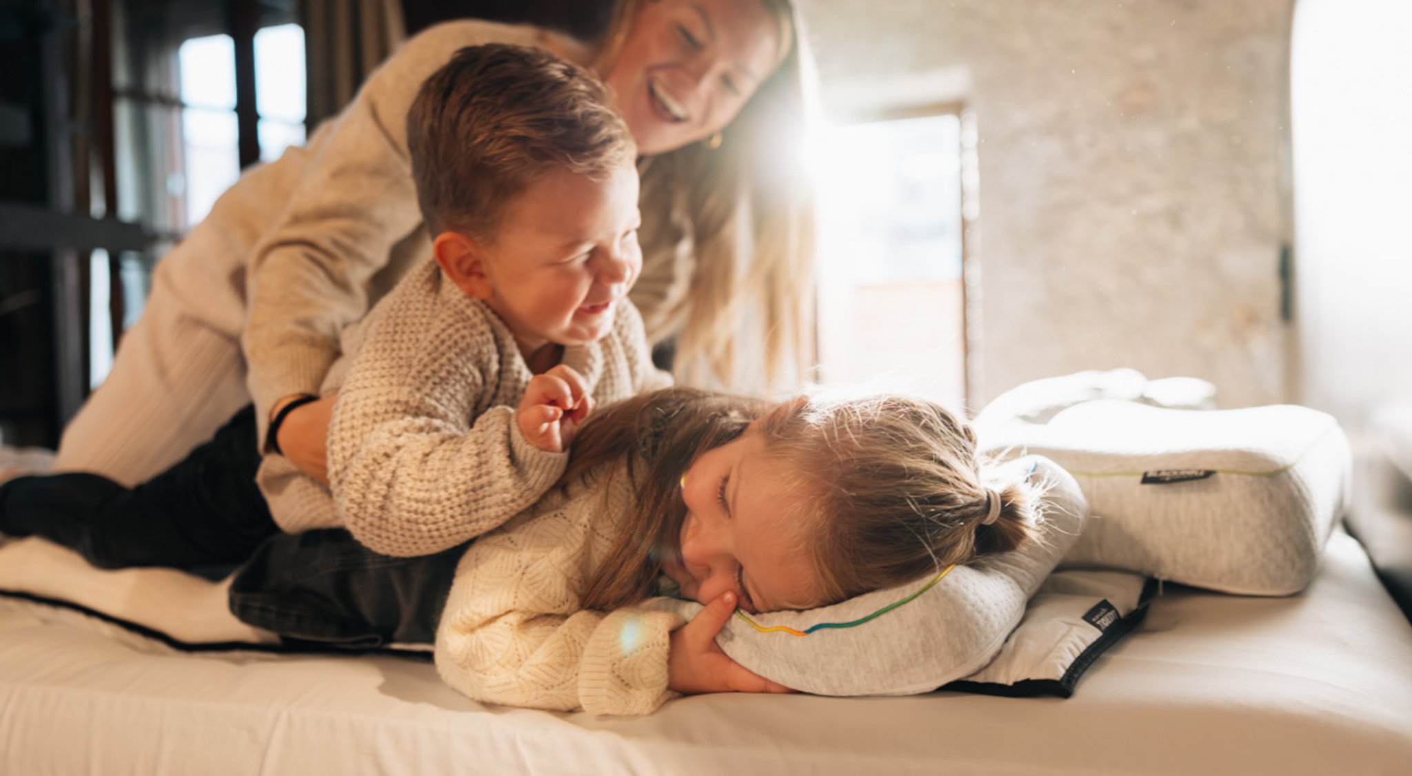 https://storage.googleapis.com/oneworld-prod/assets/sleep_shooting_new_pillows.jpg?v=1759999711