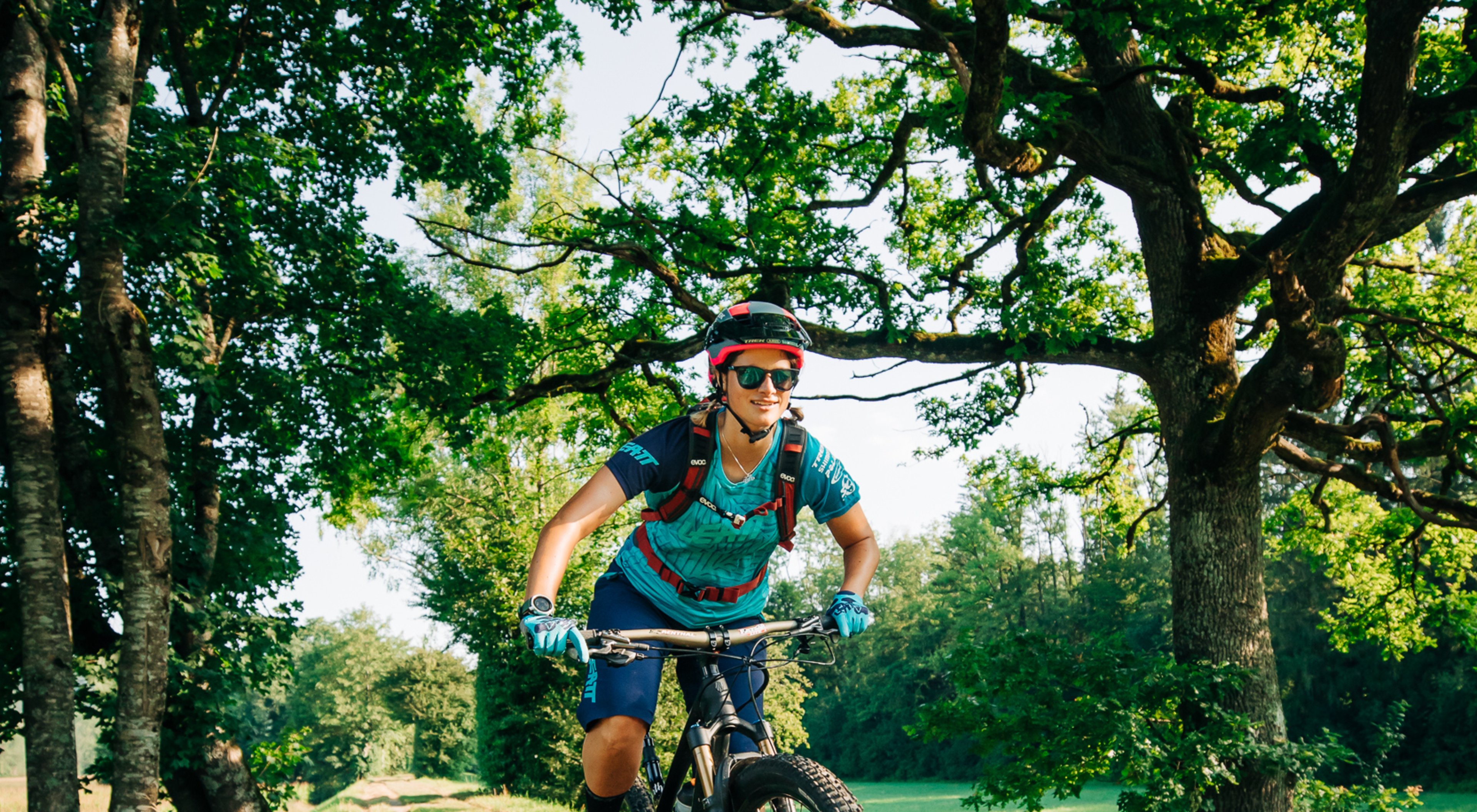 https://storage.googleapis.com/oneworld-prod/assets/mountain-biking.jpg?v=1658476291
