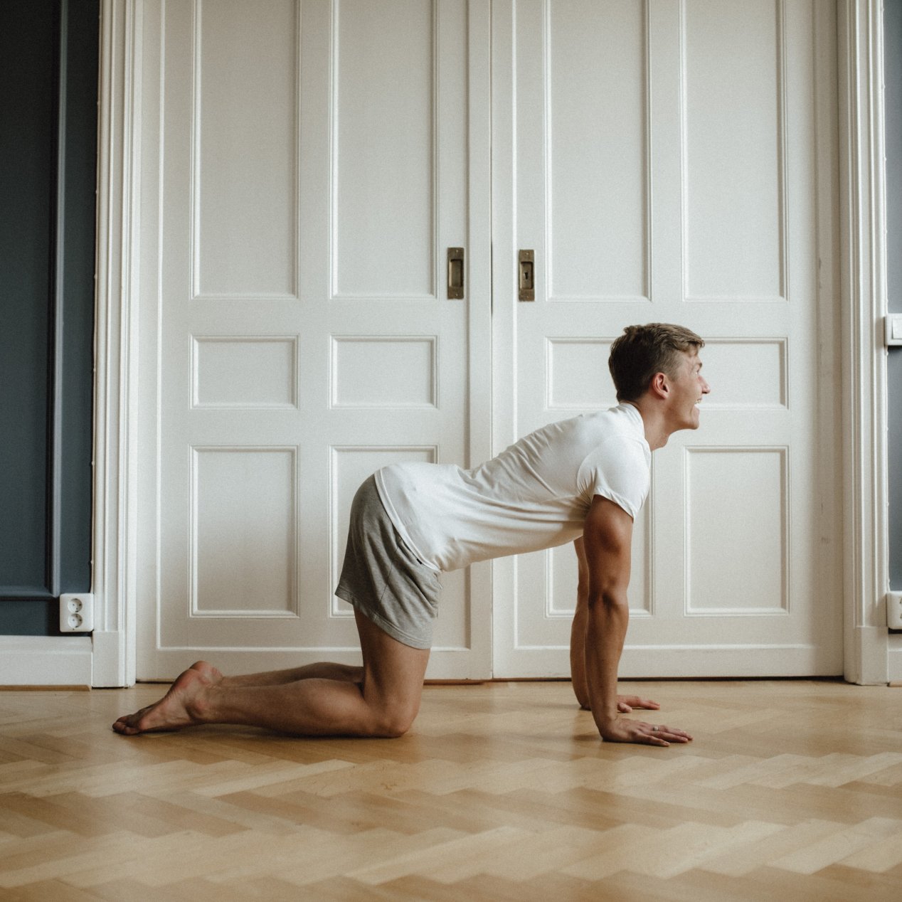 Cow: Move in the opposite direction, arching your spine into a hollow back, also segment by segment.
