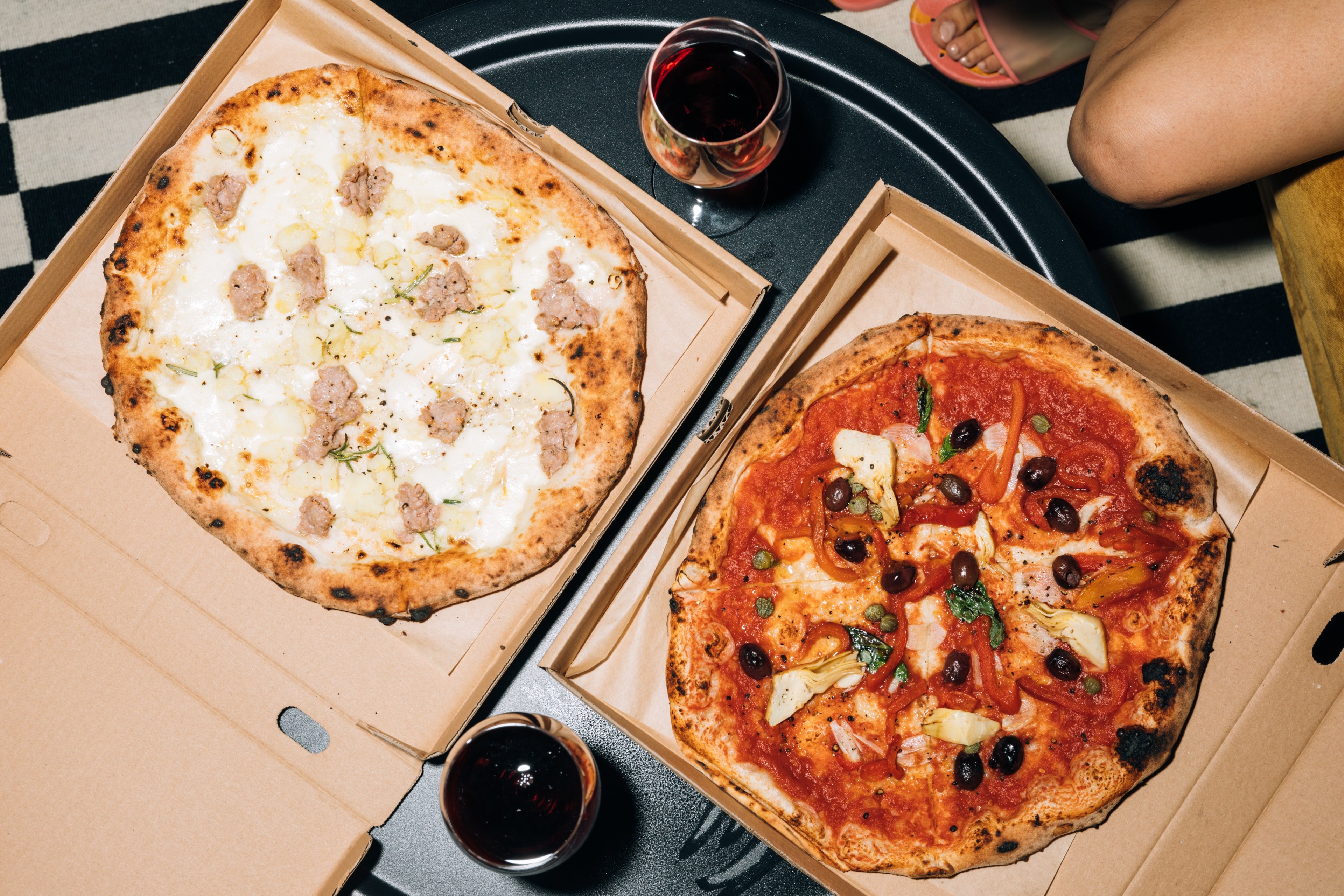 Two pizzas in a box