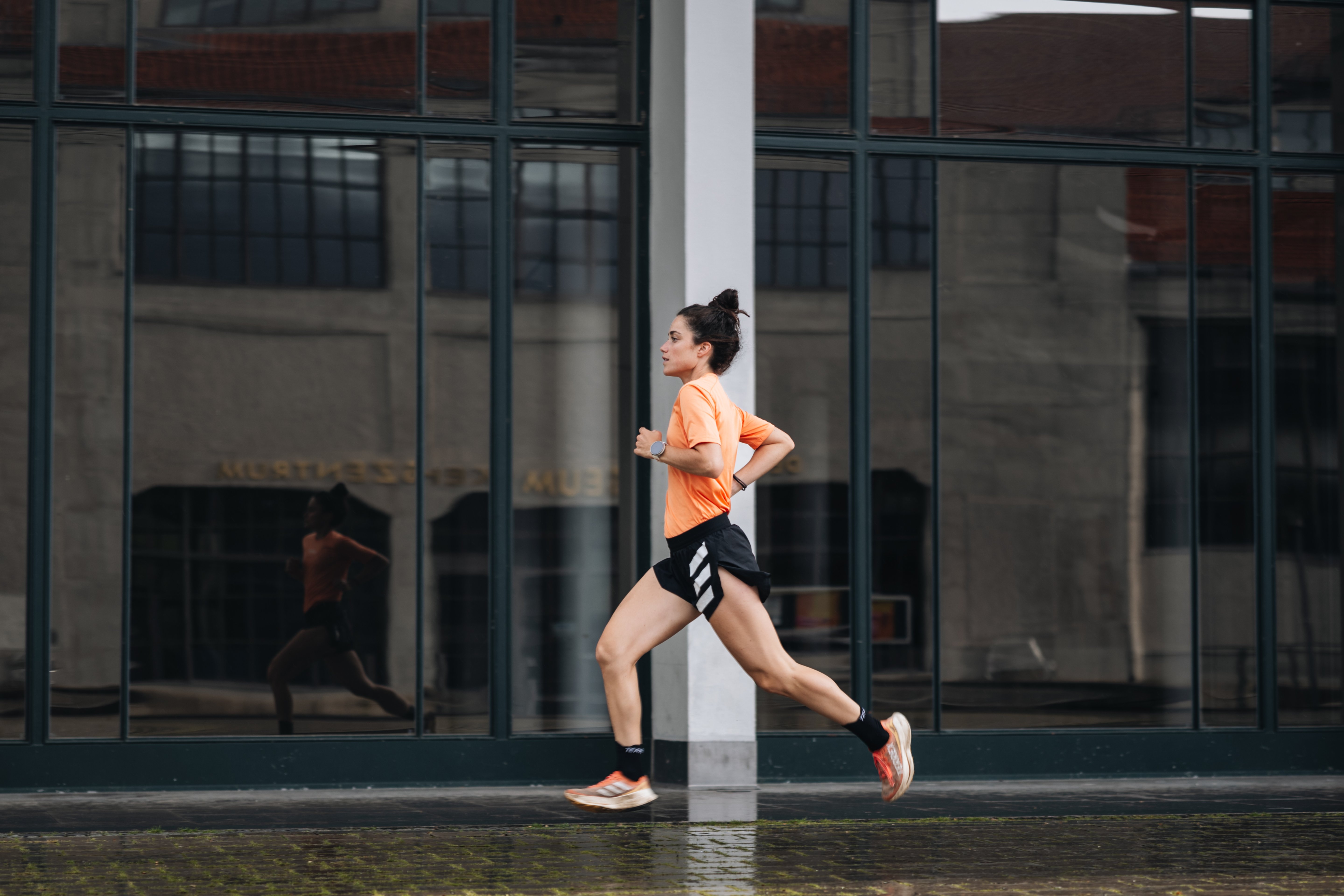 young female runner in the city