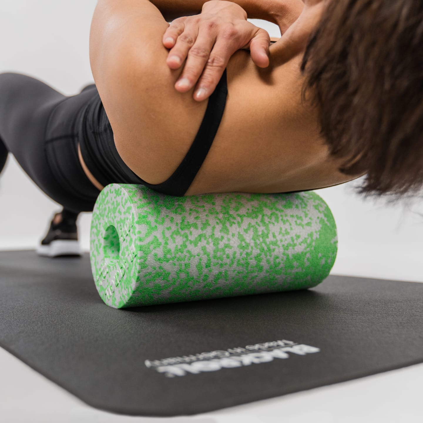 Back training on fascia roll MED