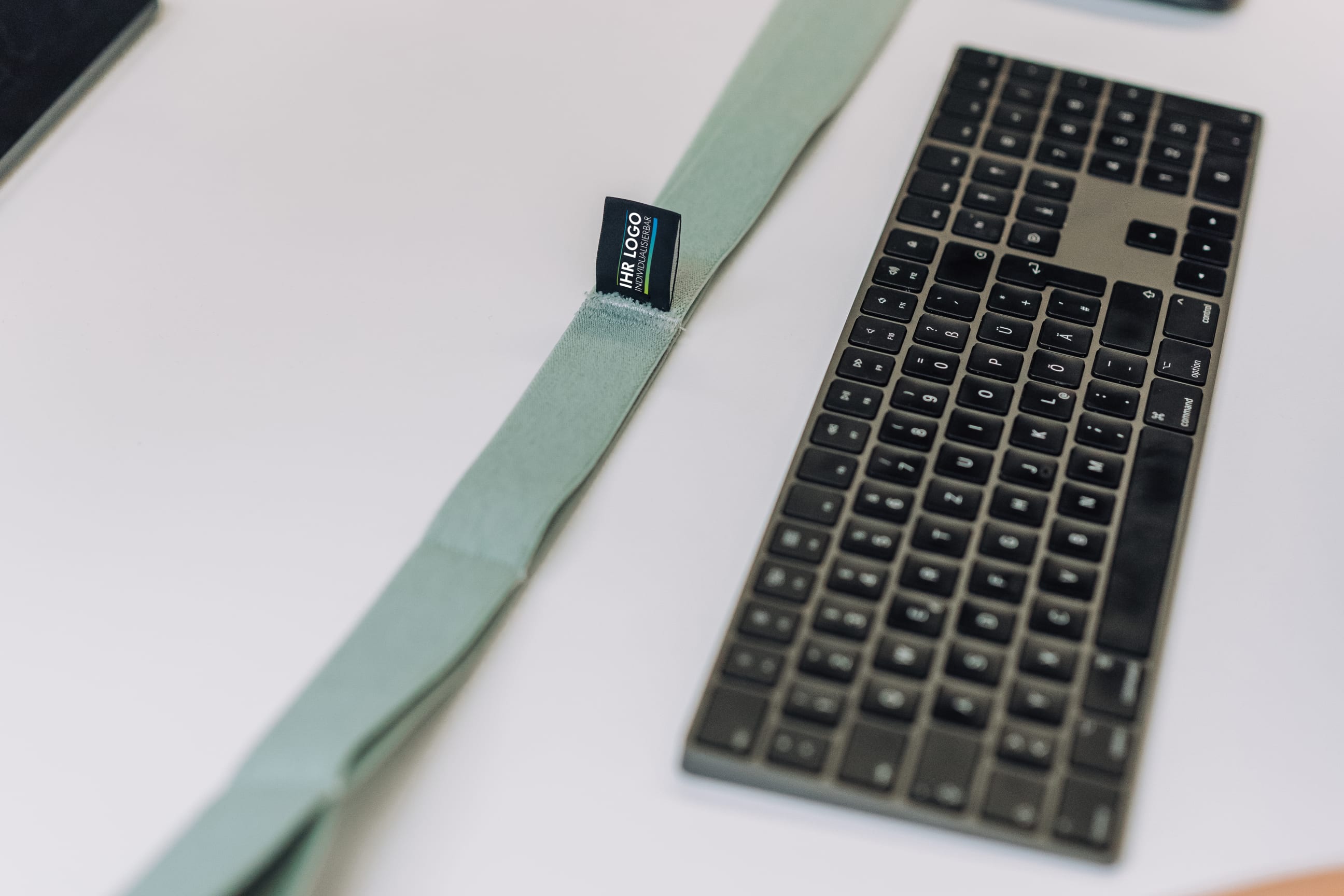 Logobeispiel Co-Branding STRETCH BAND