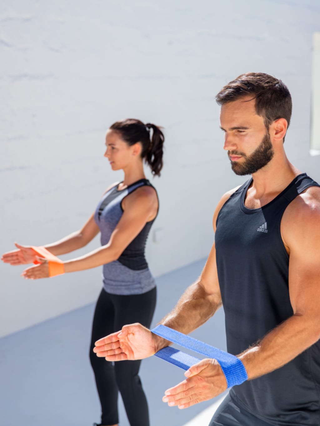 team stretching with loop bands