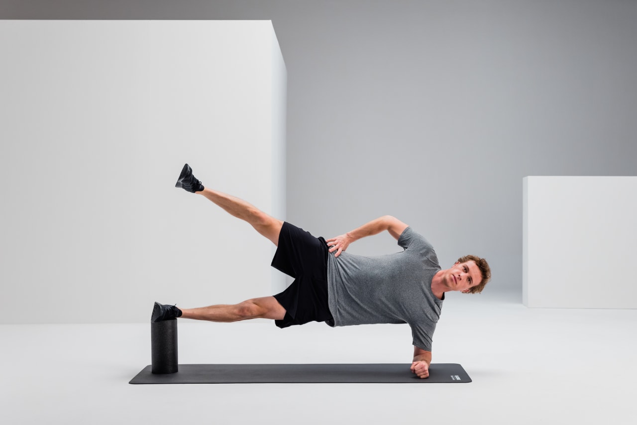 Side plank upper leg lifts strengthening