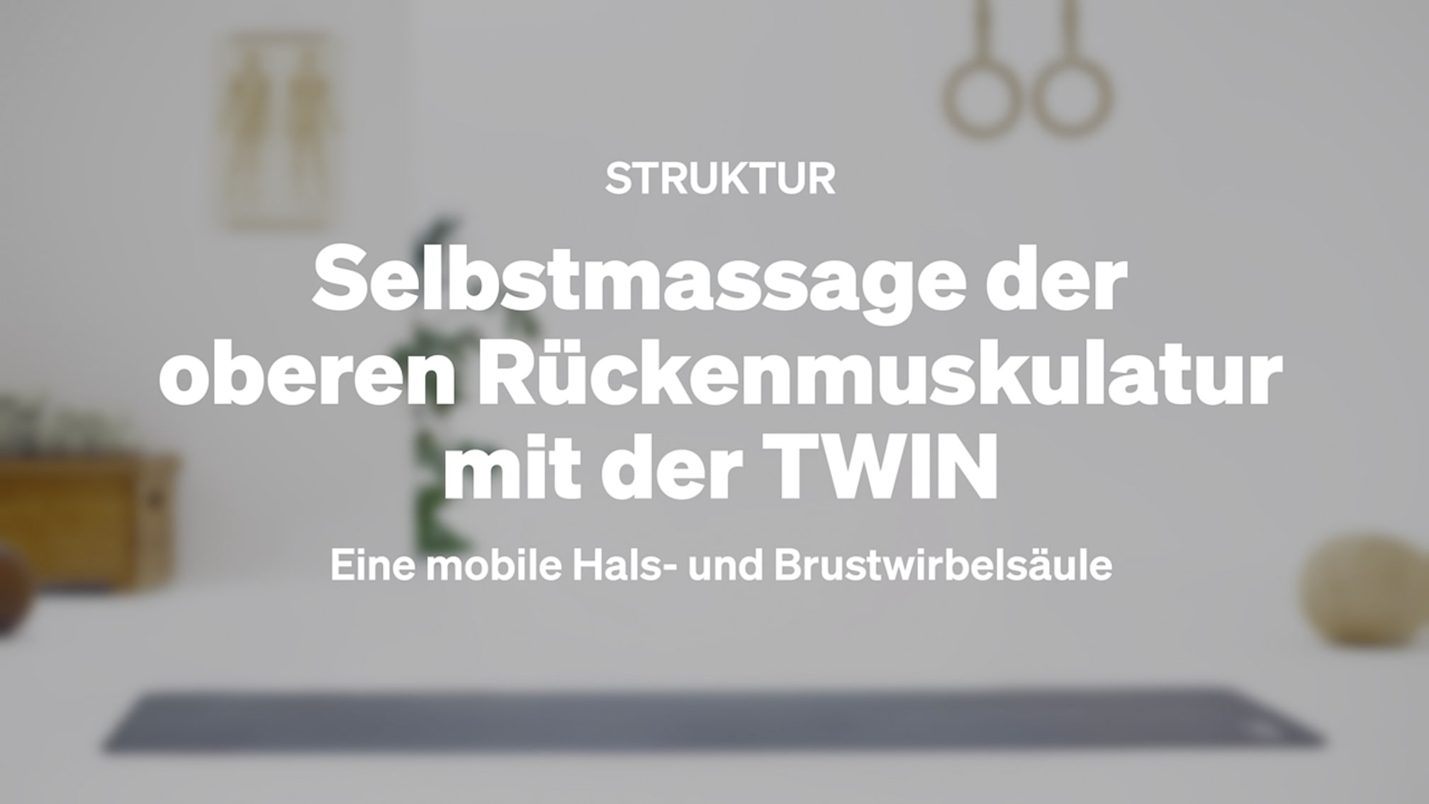 Selbstmassage der oberen Rückenmuskulatur mit der TWIN