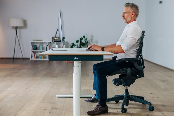 Correct posture when sitting at a desk